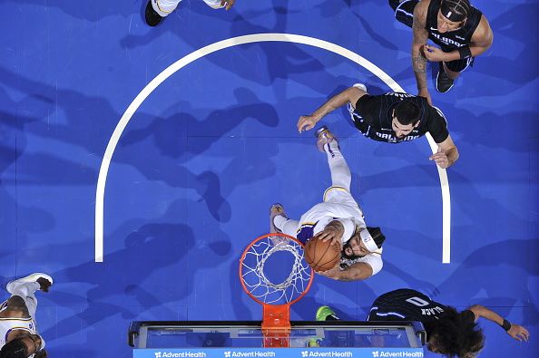 ORLANDO, FL - NOVEMBER 4: Anthony Davis #3 of the Los Angeles Lakers drives to the basket during the game against the Orlando Magic on November 4, 2023 at Amway Center in Orlando, Florida. NOTE TO USER: User expressly acknowledges and agrees that, by downloading and or using this photograph, User is consenting to the terms and conditions of the Getty Images License Agreement. Mandatory Copyright Notice: Copyright 2023 NBAE (Photo by Fernando Medina/NBAE via Getty Images)