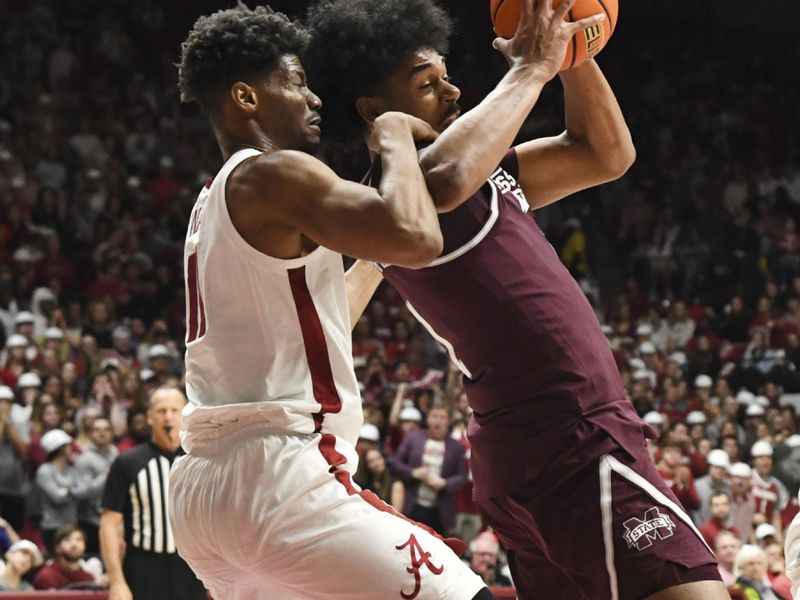 Feb 3, 2024; Tuscaloosa, Alabama, USA; Mississippi State forward Tolu Smith III (1) takes pass in the lane with Alabama forward Mohamed Wague (11) defending at Coleman Coliseum. Mandatory Credit: Gary Cosby Jr.-USA TODAY Sports