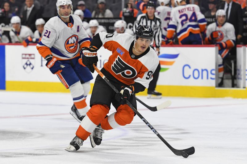 Sep 26, 2024; Philadelphia, Pennsylvania, USA; Philadelphia Flyers right wing Anthony Richard (90) skates with the puck against the New York Islanders during the second period at Wells Fargo Center. Mandatory Credit: Eric Hartline-Imagn Images