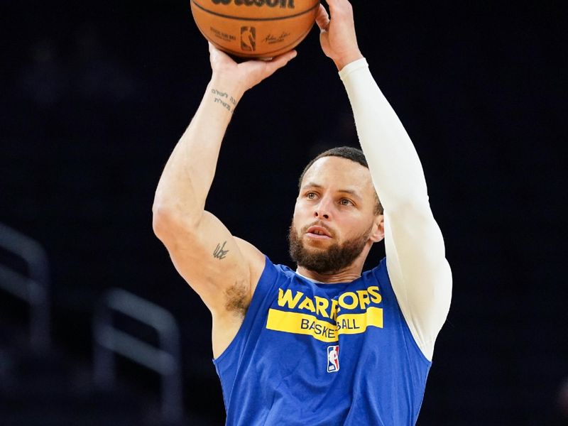 SAN FRANCISCO, CA - MARCH 24: Stephen Curry #30 of the Golden State Warriors warms up before the game against the Philadelphia 76ers at Chase Center on March 24, 2023 in San Francisco, California. NOTE TO USER: User expressly acknowledges and agrees that, by downloading and/or using this photograph, User is consenting to the terms and conditions of the Getty Images License Agreement. (Photo by Kavin Mistry/Getty Images)