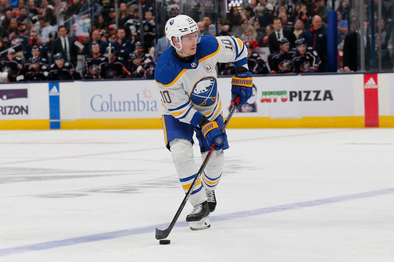 Feb 23, 2024; Columbus, Ohio, USA; Buffalo Sabres defenseman Henri Jokiharju (10) looks to pass against the Columbus Blue Jackets during the second period at Nationwide Arena. Mandatory Credit: Russell LaBounty-USA TODAY Sports