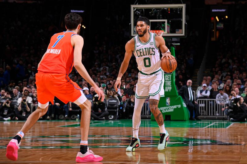 BOSTON, MA - APRIL 3: Jayson Tatum #0 of the Boston Celtics looks on during the game against the Oklahoma City Thunder on April 3, 2024 at the TD Garden in Boston, Massachusetts. NOTE TO USER: User expressly acknowledges and agrees that, by downloading and or using this photograph, User is consenting to the terms and conditions of the Getty Images License Agreement. Mandatory Copyright Notice: Copyright 2024 NBAE  (Photo by Brian Babineau/NBAE via Getty Images)