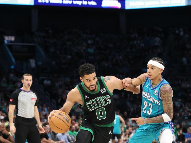 CHARLOTTE, NC - APRIL 1: Jayson Tatum #0 of the Boston Celtics drives to the basket during the game against the Charlotte Hornets on April 1, 2024 at Spectrum Center in Charlotte, North Carolina. NOTE TO USER: User expressly acknowledges and agrees that, by downloading and or using this photograph, User is consenting to the terms and conditions of the Getty Images License Agreement.  Mandatory Copyright Notice:  Copyright 2024 NBAE (Photo by Brock Williams-Smith/NBAE via Getty Images)