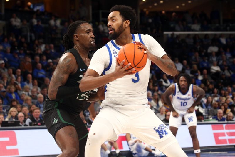 Feb 11, 2024; Memphis, Tennessee, USA; Memphis Tigers center Jordan Brown (3) spins toward the basket as Tulane Green Wave forward Kevin Cross (24) defends during the first half at FedExForum. Mandatory Credit: Petre Thomas-USA TODAY Sports