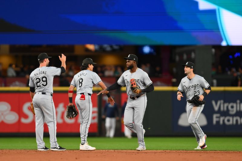 Jun 13, 2024; Seattle, Washington, USA; The Chicago White Sox celebrate defeating the Seattle Mariners at T-Mobile Park. Mandatory Credit: Steven Bisig-USA TODAY Sports