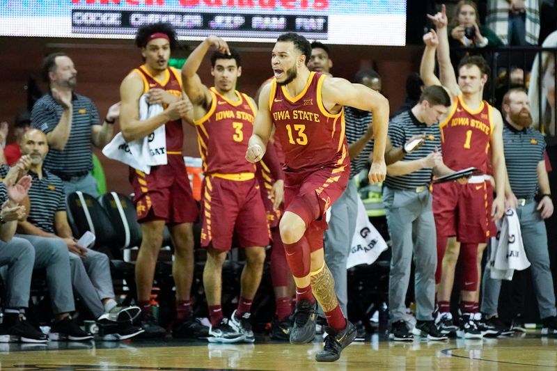 Mar 4, 2023; Waco, Texas, USA; Iowa State guard Jaren Holmes (13) and the Cyclone bench react after a basket against the Baylor Bears during the second half at Ferrell Center. Mandatory Credit: Raymond Carlin III-USA TODAY Sports