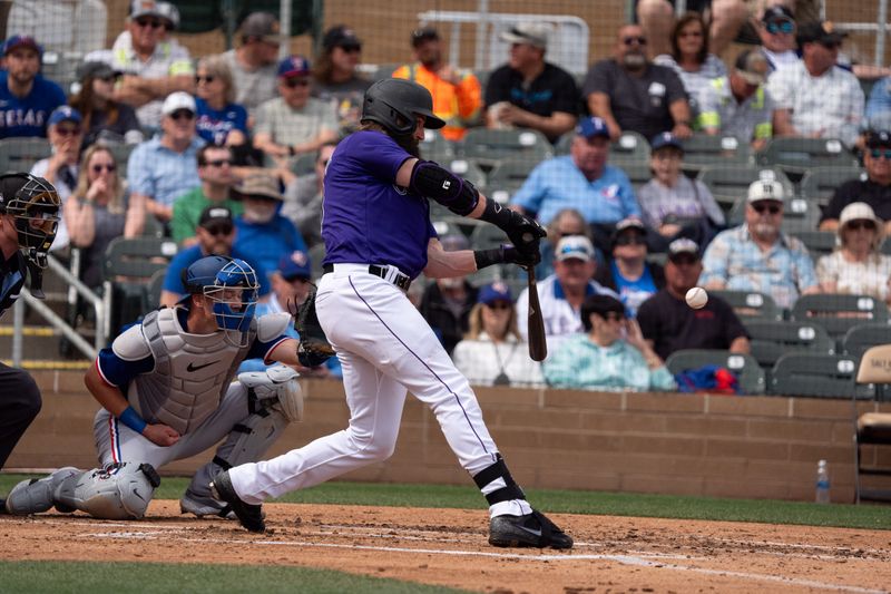 Mar 6, 2024; Salt River Pima-Maricopa, Arizona, USA; Colorado Rockies designated hitter Charlie Blackmon (19) at bat in the fifth during a spring training game against  the Texas Rangers at Salt River Fields at Talking Stick. Mandatory Credit: Allan Henry-USA TODAY Sports