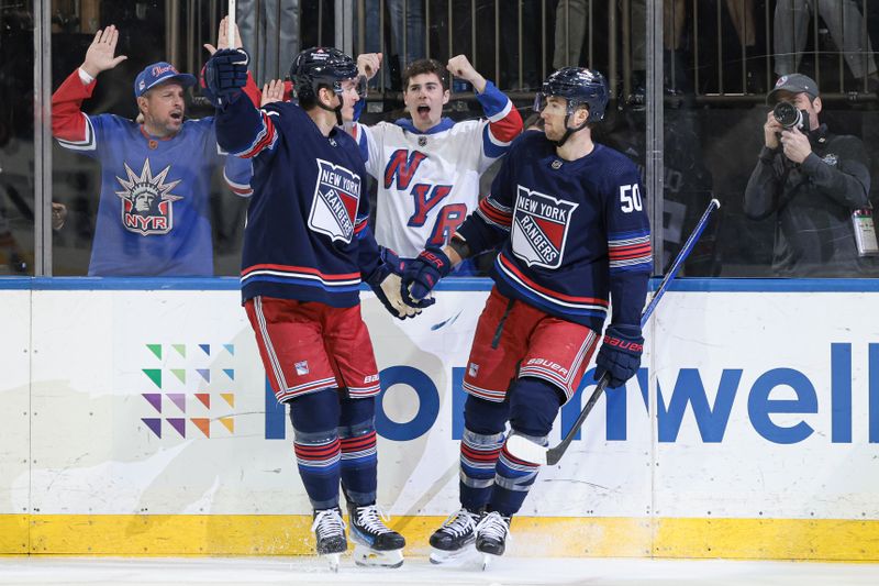 Mar 17, 2024; New York, New York, USA; New York Rangers left wing Will Cuylle (50) celebrates his goal with left wing Jimmy Vesey (26) during the second period against the New York Islanders at Madison Square Garden. Mandatory Credit: Vincent Carchietta-USA TODAY Sports