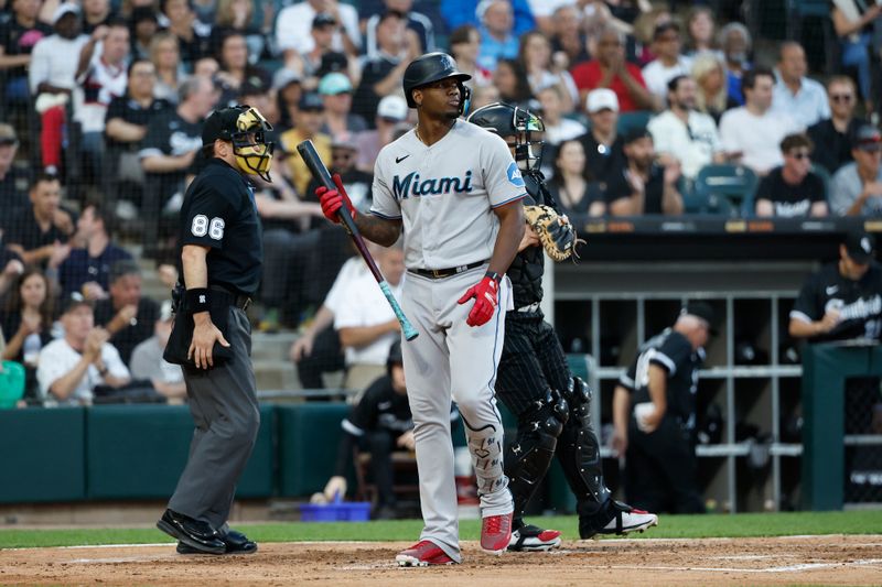 Jun 9, 2023; Chicago, Illinois, USA; Miami Marlins right fielder Jesus Sanchez (7) reacts after striking out against the Chicago White Sox during the third inning at Guaranteed Rate Field. Mandatory Credit: Kamil Krzaczynski-USA TODAY Sports