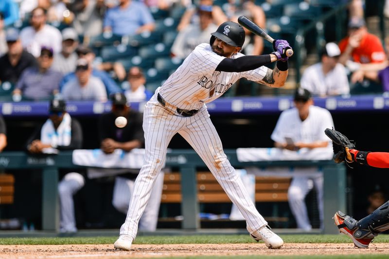 Jul 24, 2024; Denver, Colorado, USA; Colorado Rockies right fielder Jake Cave (11) leans away from a pitch in the sixth inning against the Boston Red Sox at Coors Field. Mandatory Credit: Isaiah J. Downing-USA TODAY Sports