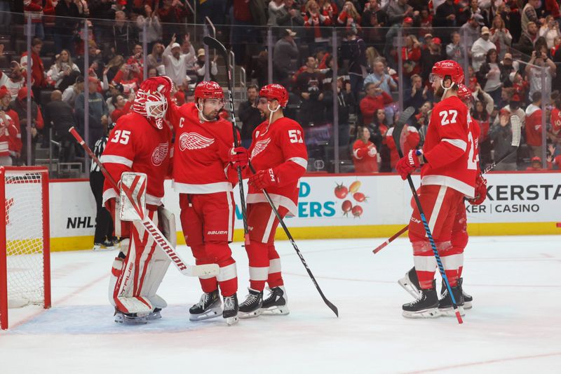 Nov 11, 2023; Detroit, Michigan, USA;  Detroit Red Wings celebrate after defeating the Columbus Blue Jackets at Little Caesars Arena. Mandatory Credit: Rick Osentoski-USA TODAY Sports