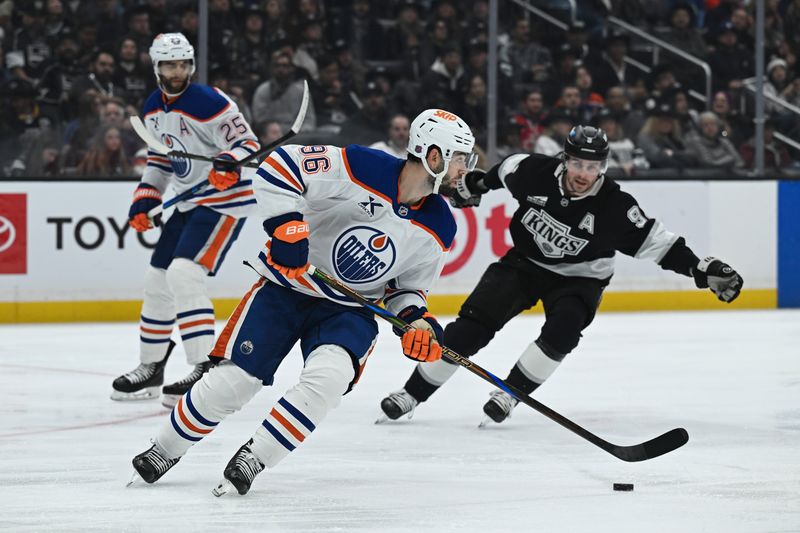 Feb 26, 2026; Los Angeles, California, USA; Edmonton Oilers defenseman Jake Walman (96) skates with the puck against the Los Angeles Kings during the second period at Crypto.com Arena. Mandatory Credit: Griffin Hooper-Imagn Images  