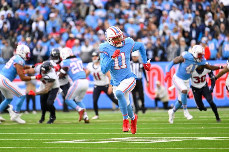 Tennessee Titans wide receiver Chris Moore (11) plays against the Houston Texans in an NFL football game Sunday, Dec. 17, 2023, in Nashville, Tenn. (AP Photo/John Amis)