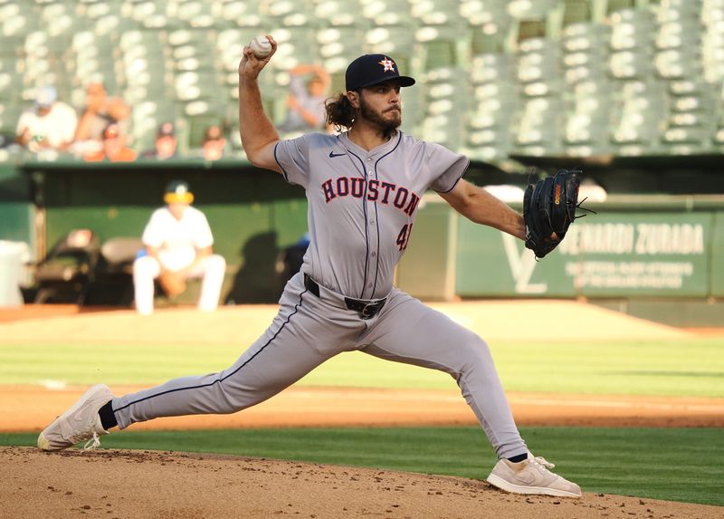 Jul 22, 2024; Oakland, California, USA; Houston Astros starting pitcher Spencer Arrighetti (41) pitches the ball against the Oakland Athletics during the first inning at Oakland-Alameda County Coliseum. Mandatory Credit: Kelley L Cox-USA TODAY Sports