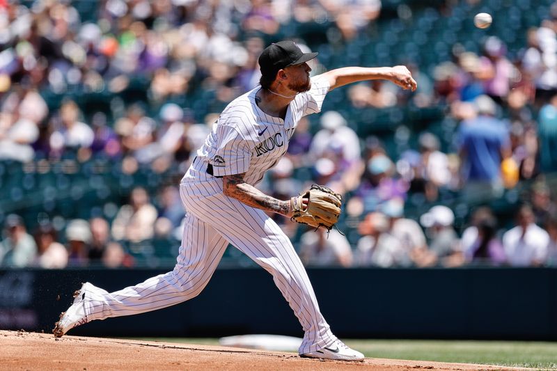 Jun 23, 2024; Denver, Colorado, USA; Colorado Rockies starting pitcher Kyle Freeland (21) pitches in the first inning against the Washington Nationals at Coors Field. Mandatory Credit: Isaiah J. Downing-USA TODAY Sports