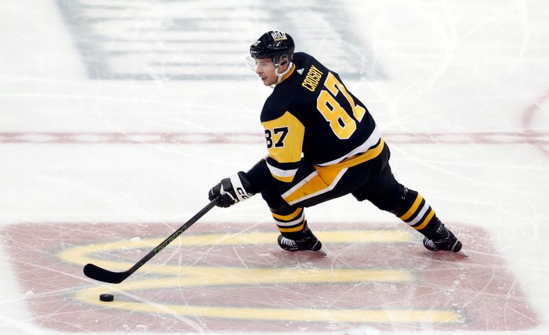 Dec 28, 2022; Pittsburgh, Pennsylvania, USA;  Pittsburgh Penguins center Sidney Crosby (87) skates with the puck against the Detroit Red Wings during the second period at PPG Paints Arena. Mandatory Credit: Charles LeClaire-USA TODAY Sports