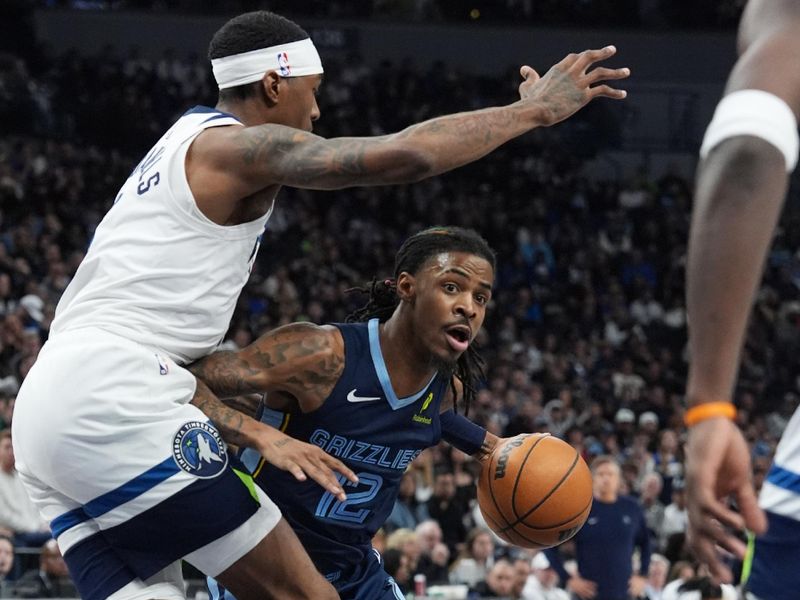 MINNEAPOLIS, MN -  JANUARY 11: Ja Morant #12 of the Memphis Grizzlies looks to pass the ball during the game against the Minnesota Timberwolves on January 11, 2025 at Target Center in Minneapolis, Minnesota. NOTE TO USER: User expressly acknowledges and agrees that, by downloading and or using this Photograph, user is consenting to the terms and conditions of the Getty Images License Agreement. Mandatory Copyright Notice: Copyright 2025 NBAE (Photo by Jordan Johnson/NBAE via Getty Images)