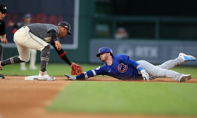 Aug 30, 2024; Washington, District of Columbia, USA; Chicago Cubs outfielder Ian Happ (8) slides safely into second base for a double during the first inning against the Washington Nationals at Nationals Park. Mandatory Credit: Daniel Kucin Jr.-USA TODAY Sports


