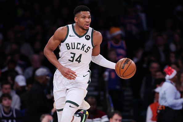 NEW YORK, NEW YORK - DECEMBER 23: Giannis Antetokounmpo #34 of the Milwaukee Bucks brings the ball up the court during the third quarter of the game against the New York Knicks at Madison Square Garden on December 23, 2023 in New York City. NOTE TO USER: User expressly acknowledges and agrees that, by downloading and or using this photograph, User is consenting to the terms and conditions of the Getty Images License Agreement. (Photo by Dustin Satloff/Getty Images)