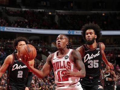 CHICAGO, IL - NOVEMBER 12: Ayo Dosunmu #12 of the Chicago Bulls drives to the basket during the game against the Detroit Pistons on November 12, 2023 at United Center in Chicago, Illinois. NOTE TO USER: User expressly acknowledges and agrees that, by downloading and or using this photograph, User is consenting to the terms and conditions of the Getty Images License Agreement. Mandatory Copyright Notice: Copyright 2023 NBAE (Photo by Gary Dineen/NBAE via Getty Images)