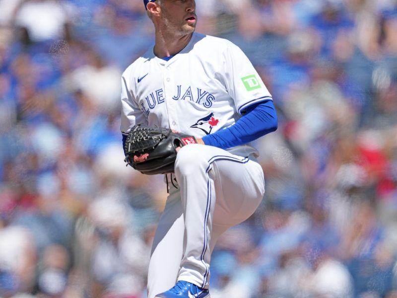 Jun 15, 2024; Toronto, Ontario, CAN; Toronto Blue Jays starting pitcher Trevor Richards (33) throws a pitch against the Cleveland Guardians during the first inning at Rogers Centre. Mandatory Credit: Nick Turchiaro-USA TODAY Sports