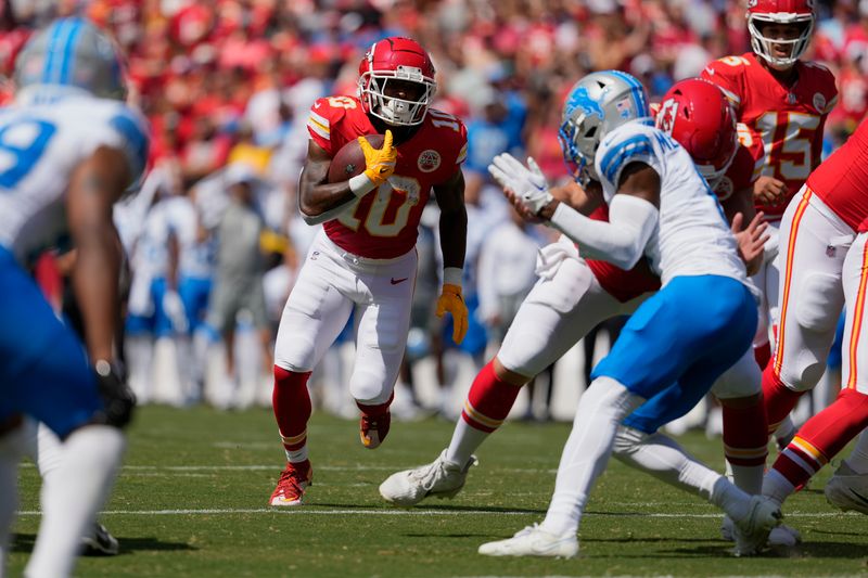 Kansas City Chiefs running back Isiah Pacheco (10) runs against the Detroit Lions during the first half of an NFL preseason football game Saturday, Aug. 17, 2024, in Kansas City, Mo. (AP Photo/Ed Zurga)