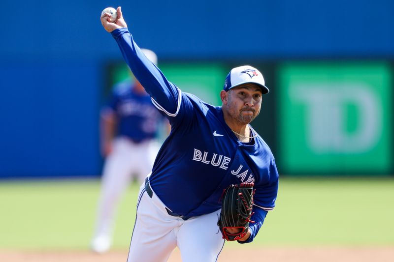 Feb 28, 2024; Dunedin, Florida, USA;  Toronto Blue Jays pitcher Paolo Espino (52) throws a pitch against the Tampa Bay Rays in the second inning at TD Ballpark. Mandatory Credit: Nathan Ray Seebeck-USA TODAY Sports