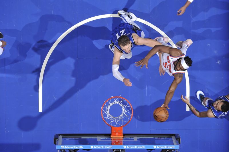 ORLANDO, FL - FEBRUARY 14: Precious Achiuwa #5 of the New York Knicks drives to the basket during the game against the Orlando Magic on February 14, 2024 at the Kia Center in Orlando, Florida. NOTE TO USER: User expressly acknowledges and agrees that, by downloading and or using this photograph, User is consenting to the terms and conditions of the Getty Images License Agreement. Mandatory Copyright Notice: Copyright 2024 NBAE (Photo by Fernando Medina/NBAE via Getty Images)