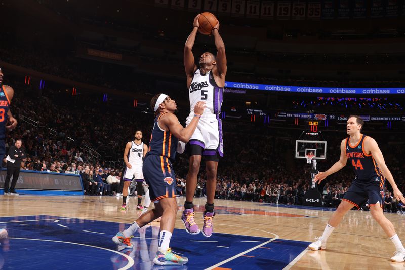 NEW YORK, NY - APRIL 4: De'Aaron Fox #5 of the Sacramento Kings rebounds the ball during the game against the New York Knicks on April 4, 2024 at Madison Square Garden in New York City, New York.  NOTE TO USER: User expressly acknowledges and agrees that, by downloading and or using this photograph, User is consenting to the terms and conditions of the Getty Images License Agreement. Mandatory Copyright Notice: Copyright 2024 NBAE  (Photo by Nathaniel S. Butler/NBAE via Getty Images)