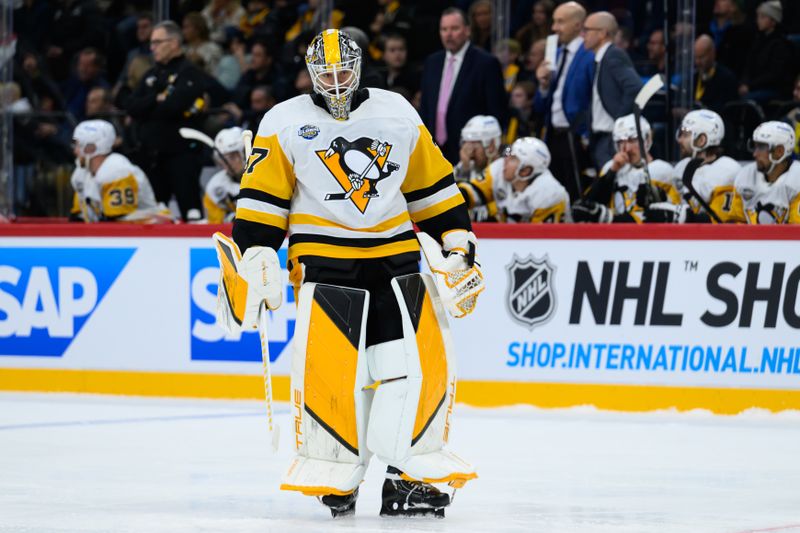 Nov 14, 2025; Stockholm, SWEDEN; Pittsburgh Penguins goaltender Arturs Silovs (37) reacts during a break in play against the Nashville Predators in a Global Series ice hockey game at Avicii Arena. Mandatory Credit: Per Haljestam-Imagn Images