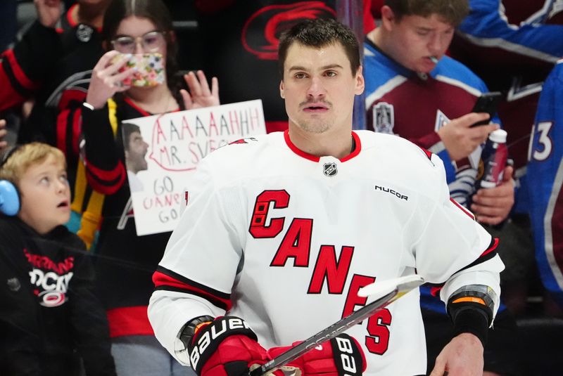 Nov 9, 2024; Denver, Colorado, USA; Carolina Hurricanes defenseman Dmitry Orlov (7) before the game against the Colorado Avalanche at Ball Arena. Mandatory Credit: Ron Chenoy-Imagn Images