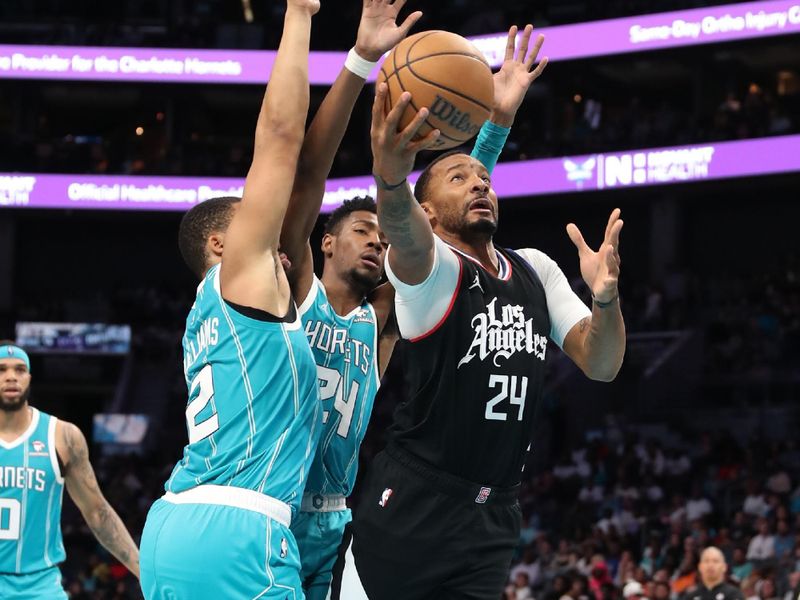 CHARLOTTE, NC - MARCH 31: Norman Powell #24 of the LA Clippers drives to the basket during the game against the Charlotte Hornets on March 31, 2024 at Spectrum Center in Charlotte, North Carolina. NOTE TO USER: User expressly acknowledges and agrees that, by downloading and or using this photograph, User is consenting to the terms and conditions of the Getty Images License Agreement.  Mandatory Copyright Notice:  Copyright 2024 NBAE (Photo by Brock Williams-Smith/NBAE via Getty Images)