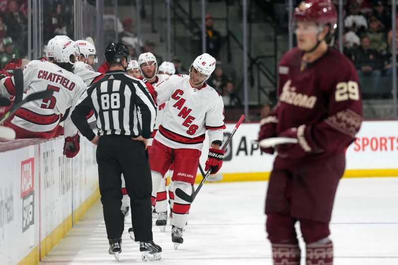 Mar 3, 2023; Tempe, Arizona, USA; Carolina Hurricanes defenseman Shayne Gostisbehere (41) celebrates his goal against the Arizona Coyotes during the second period at Mullett Arena. Mandatory Credit: Joe Camporeale-USA TODAY Sports