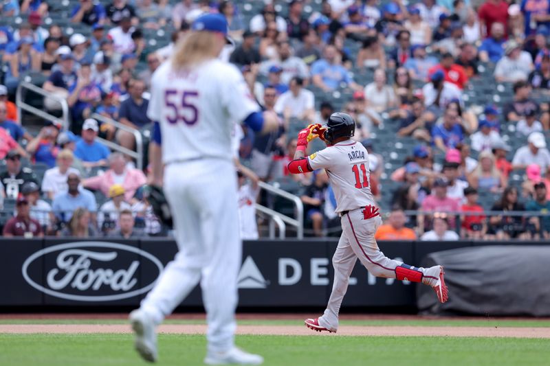 Jul 28, 2024; New York City, New York, USA; Atlanta Braves shortstop Orlando Arcia (11) rounds the bases after hitting a solo home run against New York Mets relief pitcher Ryne Stanek (55) during the seventh inning at Citi Field. Mandatory Credit: Brad Penner-USA TODAY Sports