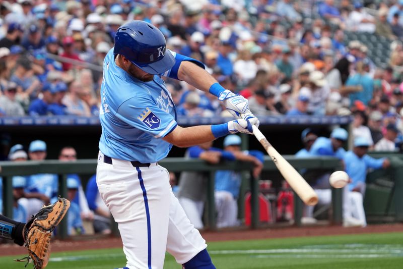 Mar 6, 2024; Surprise, Arizona, USA; Kansas City Royals shortstop Garrett Hampson (2) bats against the Seattle Mariners during the second inning at Surprise Stadium. Mandatory Credit: Joe Camporeale-USA TODAY Sports