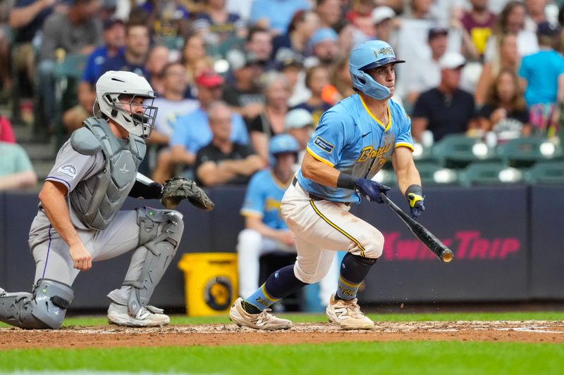 Jun 27, 2025; Milwaukee, Wisconsin, USA;  Milwaukee Brewers right fielder Sal Frelick (10) drives in a run during the fourth inning against the Colorado Rockies at American Family Field. Mandatory Credit: Jeff Hanisch-Imagn Images