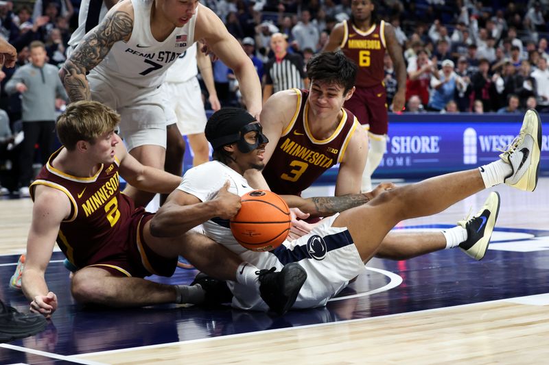 Feb 1, 2026; University Park, Pennsylvania, USA; Penn State Nittany Lions guard Kayden Mingo (4) and Minnesota Golden Gophers forward Grayson Grove (2) and forward Bobby Durkin (3) fight for the ball during the second half at Bryce Jordan Center. Mandatory Credit: Matthew O'Haren-Imagn Images