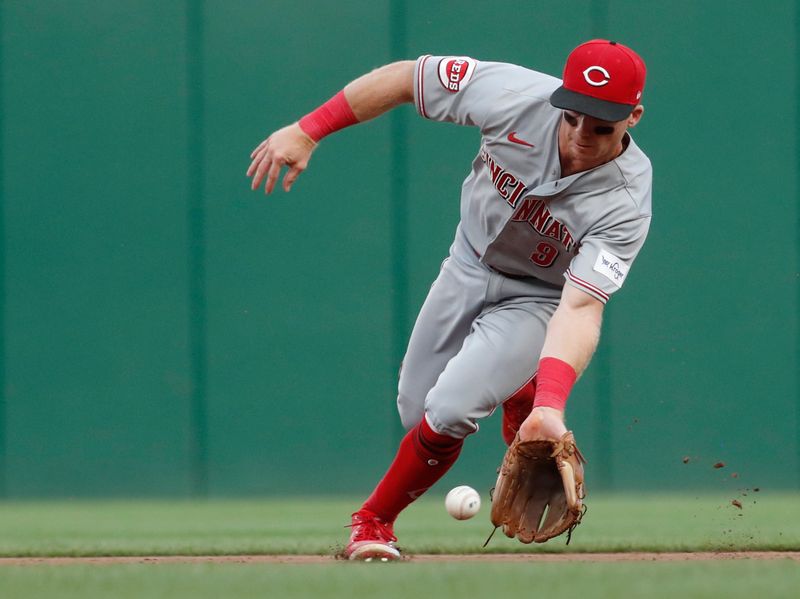 Aug 13, 2023; Pittsburgh, PA, USA; Cincinnati Reds second baseman Matt McLain (9) fields a ground ball for an out against Pittsburgh Pirates first baseman Alfonso Rivas (not pictured) during the fourth inning at PNC Park. Mandatory Credit: Charles LeClaire-USA TODAY Sports