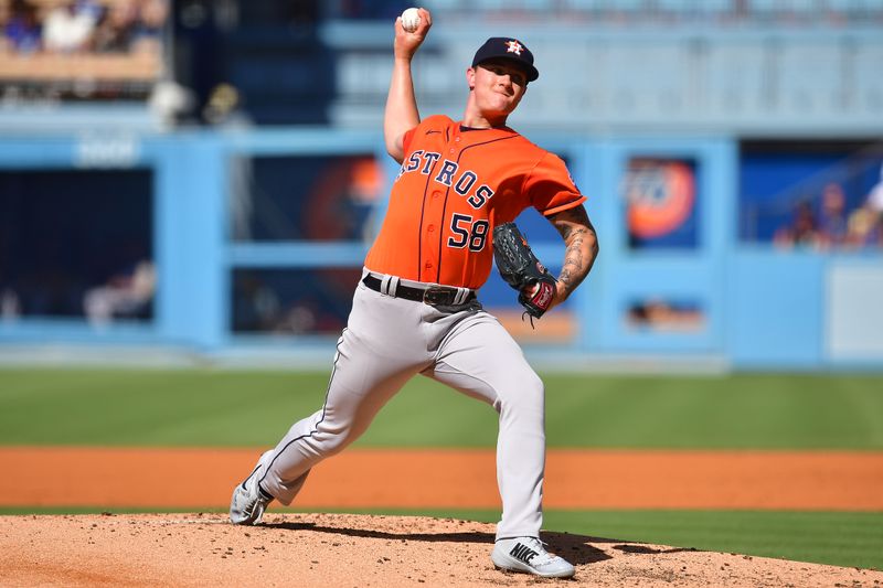 Jun 25, 2023; Los Angeles, California, USA; Houston Astros starting pitcher Hunter Brown (58) throws against the Los Angeles Dodgers during the second inning at Dodger Stadium. Mandatory Credit: Gary A. Vasquez-USA TODAY Sports