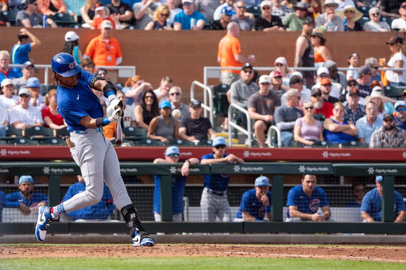 Feb 24, 2024; Scottsdale, Arizona, USA; Chicago Cubs outfielder Kevin Alcantara (88) lines out to center field in the fourth inning during a spring training game against the San Francisco Giants at Scottsdale Stadium. Mandatory Credit: Allan Henry-USA TODAY Sports