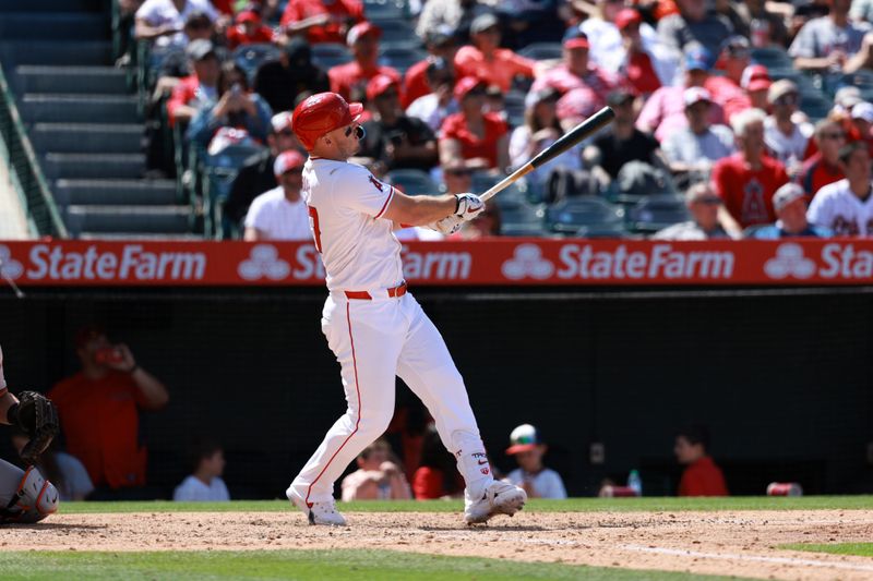 Apr 24, 2024; Anaheim, California, USA;  Los Angeles Angels designated hitter Mike Trout (27) hits a home run during the sixth inning against the Baltimore Orioles at Angel Stadium. Mandatory Credit: Kiyoshi Mio-USA TODAY Sports