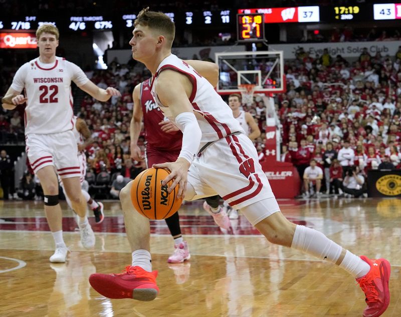 Feb. 18, 2023; Madison, WI, USA; Wisconsin Badgers guard Connor Essegian (3) drives to the hoop during the second half against the Rutgers Scarlet Knights at the Kohl Center. Rutgers beat Wisconsin 58-57. Mandatory Credit: Mark Hoffman-USA TODAY Sports