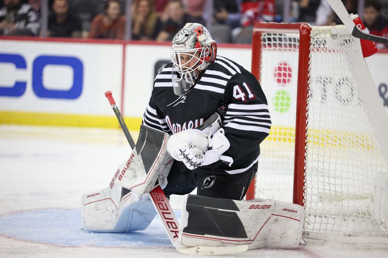 Oct 27, 2023; Newark, New Jersey, USA; New Jersey Devils goaltender Vitek Vanecek (41) makes a save during the second period against the Buffalo Sabres at Prudential Center. Mandatory Credit: Vincent Carchietta-USA TODAY Sports