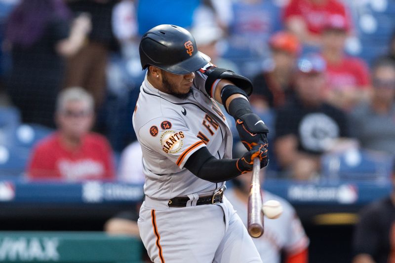 Aug 22, 2023; Philadelphia, Pennsylvania, USA; San Francisco Giants second baseman Thairo Estrada (39) hits a single during the first inning against the Philadelphia Phillies at Citizens Bank Park. Mandatory Credit: Bill Streicher-USA TODAY Sports