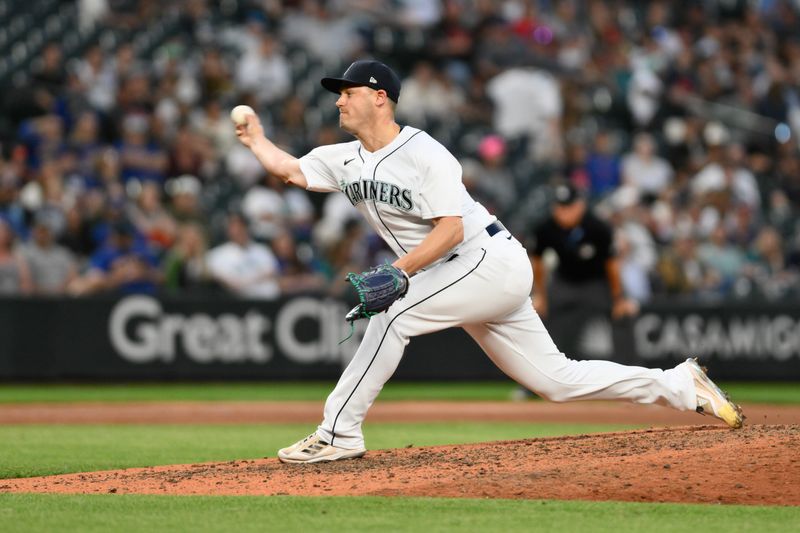 Jun 27, 2023; Seattle, Washington, USA; Seattle Mariners relief pitcher Paul Sewald (37) pitches to the Washington Nationals during the eighth inning at T-Mobile Park. Mandatory Credit: Steven Bisig-USA TODAY Sports