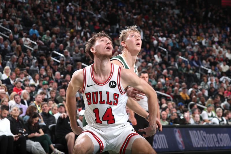 MILWAUKEE, WI - NOVEMBER 20: Matas Buzelis #14 of Chicago Bulls boxes out during the game against the Milwaukee Bucks on November 20, 2024 at the Fiserv Forum Center in Milwaukee, Wisconsin. NOTE TO USER: User expressly acknowledges and agrees that, by downloading and or using this Photograph, user is consenting to the terms and conditions of the Getty Images License Agreement. Mandatory Copyright Notice: Copyright 2024 NBAE (Photo by Gary Dineen/NBAE via Getty Images).