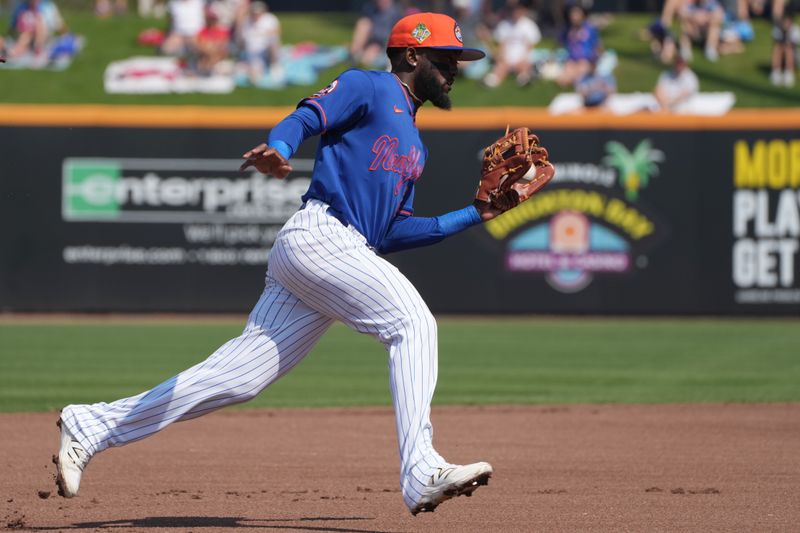 Feb 25, 2026; Port St. Lucie, Florida, USA;  New York Mets third baseman Vidal Bruján (2) fields a ground ball in the second inning against the St. Louis Cardinals at Clover Park. Mandatory Credit: Jim Rassol-Imagn Images