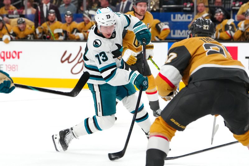 Oct 26, 2024; Las Vegas, Nevada, USA; San Jose Sharks center Tyler Toffoli (73) shoots against the Vegas Golden Knights during the first period at T-Mobile Arena. Mandatory Credit: Stephen R. Sylvanie-Imagn Images