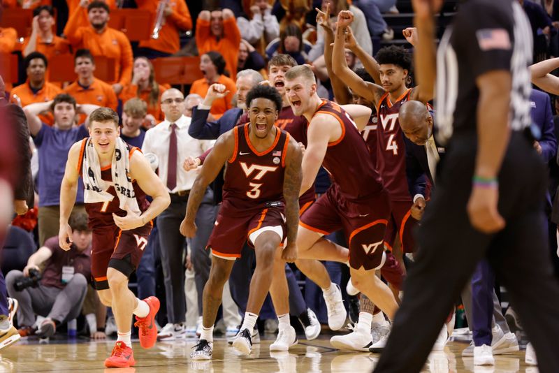 Feb 1, 2025; Charlottesville, Virginia, USA; Virginia Tech Hokies players celebrate after defeating the Virginia Cavaliers at John Paul Jones Arena. Mandatory Credit: Amber Searls-Imagn Images