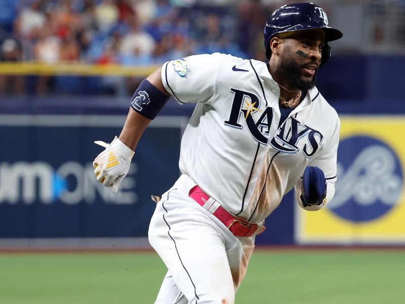 Aug 10, 2023; St. Petersburg, Florida, USA;  Tampa Bay Rays first baseman Yandy Diaz (2) runs home to score a run during the ninth inning against the St. Louis Cardinals at Tropicana Field. Mandatory Credit: Kim Klement Neitzel-USA TODAY Sports